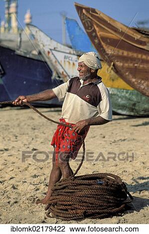Fisherman, Kovalam, Kerala, South India, India, Asia View Large Photo Image Stock Image - Fisherman, Kovalam, Kerala, South India, India, Asia. Fotosearch