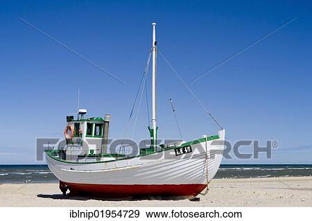 Fishing cutter on the beach in Loekken or Lokken, Northern Jutland, Denmark, Europe View Large Photo Image Stock Photo - Fishing cutter on the beach in Loekken or Lokken, Northern Jutland, Denmark, Europe. Fotosearch