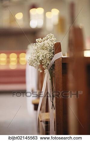 Floral arrangement, decorations in a church for a church wedding View Large Photo Image Stock Image - Floral arrangement, decorations in a church for a church wedding. Fotosearch
