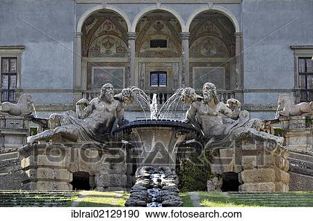 Stock Image - Fontana del Bicci fountain with river gods of the Nile and the Tiber, Catena d'aqua waterfall in the garden of the palazzo in Fortezza, palace, Villa Farnese, Caprarola, Latium region, Italy, Europe. Fotosearch