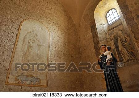 Fresco of St Anthony the Great, or Antonio Abate, with a statue of Anthony of Padua, in a side chapel of the Gothic basilica of the Cistercian monastery Fossanova Abbey, near Priverno, Lazio, Italy, Europe View Large Photo Image Stock Image - Fresco of St Anthony the Great, or Antonio Abate, with a statue of Anthony of Padua, in a side chapel of the Gothic basilica of the Cistercian monastery Fossanova Abbey, near Priverno, Lazio, Italy, Europe. Fotosearch