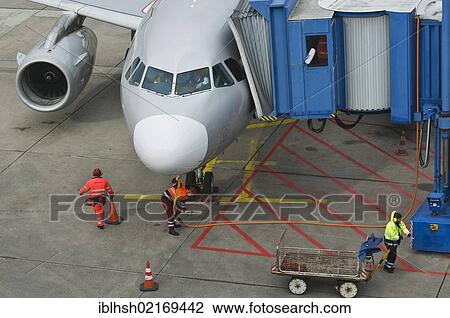 Stock Image - Germanwings aircraft being fueled and unloaded on the apron, Cologne Bonn Airport, also called Airport Konrad Adenauer, North Rhine-Westphalia, Germany, Europe. Fotosearch