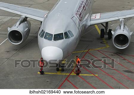 Germanwings aircraft, finishing touches prior to take-off, apron workers at the machine, Cologne Bonn Airport, also called Airport Konrad Adenauer, North Rhine-Westphalia, Germany, Europe View Large Photo Image Stock Image - Germanwings aircraft, finishing touches prior to take-off, apron workers at the machine, Cologne Bonn Airport, also called Airport Konrad Adenauer, North Rhine-Westphalia, Germany, Europe. Fotosearch
