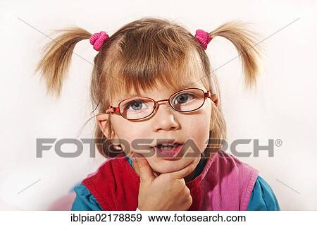 Girl, 5, with pigtails and glasses View Large Photo Image Stock Photo - Girl, 5, with pigtails and glasses. Fotosearch