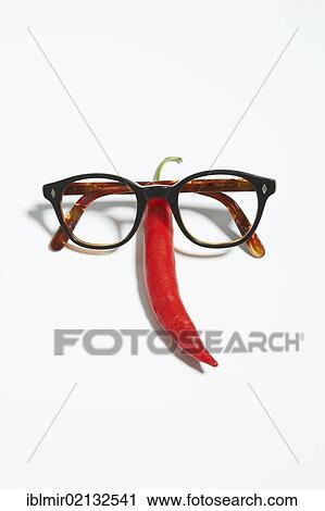 Glasses and a red pepper View Large Photo Image Stock Image - Glasses and a red pepper. Fotosearch