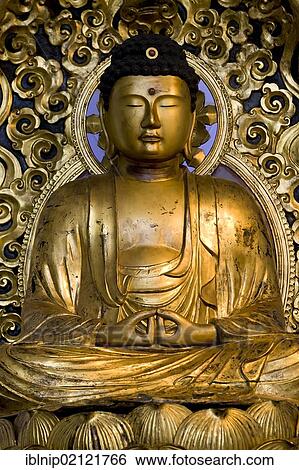 Stock Photograph - Golden Buddha statue. Fotosearch