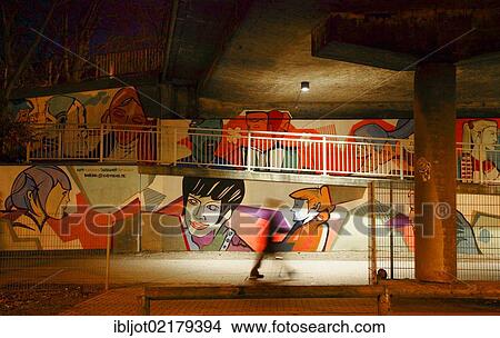 Picture - Graffiti under a road bridge, Alfredstrasse, B224, footpath and cycle path, Essen, North Rhine-Westphalia, Germany, Europe. Fotosearch