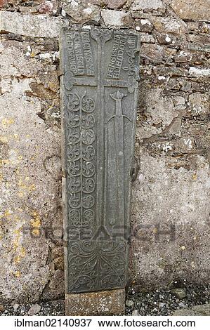 Grave stone with a sword, Clonca Church near Culduff, Inishowen Peninsula, County Donegal, Ireland, British Isles, Europe View Large Photo Image Stock Photo - Grave stone with a sword, Clonca Church near Culduff, Inishowen Peninsula, County Donegal, Ireland, British Isles, Europe. Fotosearch