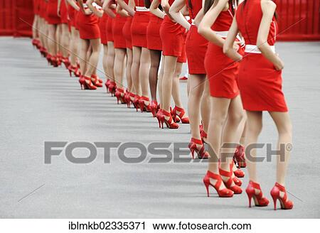 Grid Girls waiting to make an appearance at the Formula 1 race at the Circuito de Catalunya bei Montmelo racetrack, Spain, Europe View Large Photo Image Stock Image - Grid Girls waiting to make an appearance at the Formula 1 race at the Circuito de Catalunya bei Montmelo racetrack, Spain, Europe. Fotosearch