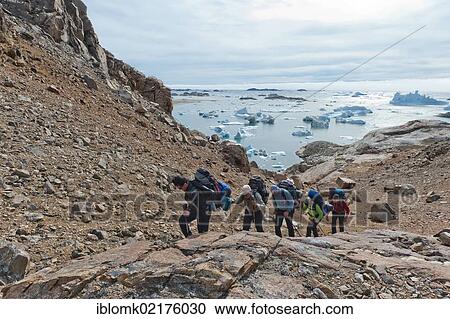 Group of hikers, Ammassalik Peninsula, at Sermilik Fjord, East Greenland, Greenland, North America View Large Photo Image Stock Image - Group of hikers, Ammassalik Peninsula, at Sermilik Fjord, East Greenland, Greenland, North America. Fotosearch