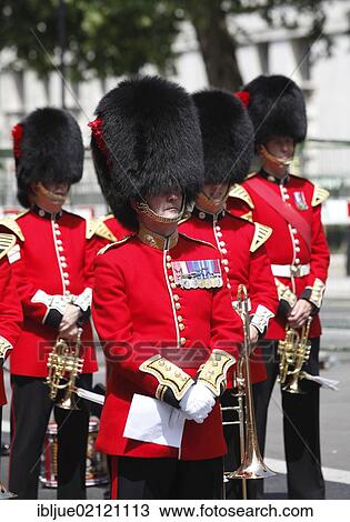 Stock Image - Guards wearing bearskin hats, Veterans' Day in London, commemoration of old war veterans in the centre of London, England, United Kingdom, Europe. Fotosearch