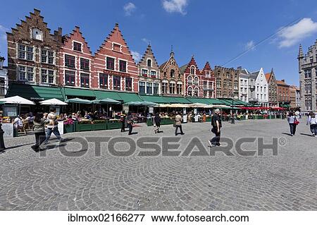 Guild houses and outdoor restaurants in Grote Markt square, historic centre of Bruges, UNESCO World Heritage Site, West Flanders, Flemish Region, Belgium, Europe View Large Photo Image Stock Photo - Guild houses and outdoor restaurants in Grote Markt square, historic centre of Bruges, UNESCO World Heritage Site, West Flanders, Flemish Region, Belgium, Europe. Fotosearch