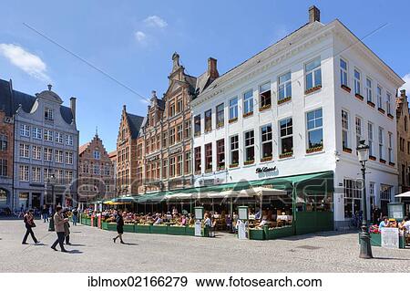 Guild houses and outdoor restaurants in Grote Markt square, historic centre of Bruges, UNESCO World Heritage Site, West Flanders, Flemish Region, Belgium, Europe View Large Photo Image Stock Photo - Guild houses and outdoor restaurants in Grote Markt square, historic centre of Bruges, UNESCO World Heritage Site, West Flanders, Flemish Region, Belgium, Europe. Fotosearch