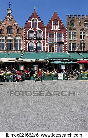 Guild houses and outdoor restaurants in Grote Markt square, historic centre of Bruges, UNESCO World Heritage Site, West Flanders, Flemish Region, Belgium, Europe View Large Photo Image Stock Photograph - Guild houses and outdoor restaurants in Grote Markt square, historic centre of Bruges, UNESCO World Heritage Site, West Flanders, Flemish Region, Belgium, Europe. Fotosearch