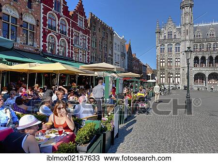 Guild houses with street restaurants on Grote Markt market square, historic town centre of Bruges, UNESCO World Heritage Site, West Flanders, Flemish Region, Belgium, Europe View Large Photo Image Stock Image - Guild houses with street restaurants on Grote Markt market square, historic town centre of Bruges, UNESCO World Heritage Site, West Flanders, Flemish Region, Belgium, Europe. Fotosearch