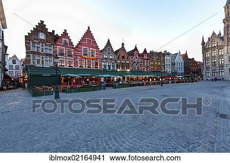 Guild houses with street restaurants on Grote Markt market square, historic town centre of Bruges, UNESCO World Heritage Site, West Flanders, Flemish Region, Belgium, Europe View Large Photo Image Stock Image - Guild houses with street restaurants on Grote Markt market square, historic town centre of Bruges, UNESCO World Heritage Site, West Flanders, Flemish Region, Belgium, Europe. Fotosearch
