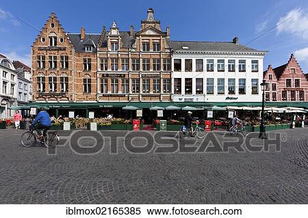 Guild houses with street restaurants on Grote Markt market square, historic city centre of Bruges, UNESCO World Heritage Site, West Flanders, Flemish Region, Belgium, Europe View Large Photo Image Stock Photography - Guild houses with street restaurants on Grote Markt market square, historic city centre of Bruges, UNESCO World Heritage Site, West Flanders, Flemish Region, Belgium, Europe. Fotosearch