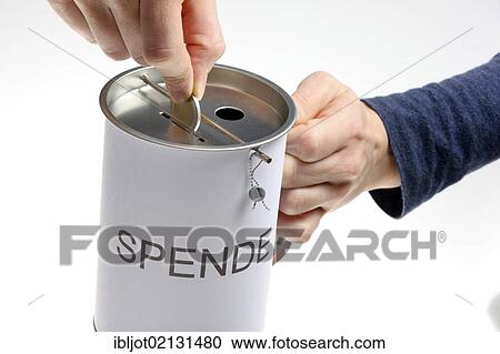 Hands with a donation box labeled Spende, German for donation, with slots for coins and bills, with a security seal to protect against unlawful opening View Large Photo Image Stock Image - Hands with a donation box labeled Spende, German for donation, with slots for coins and bills, with a security seal to protect against unlawful opening. Fotosearch