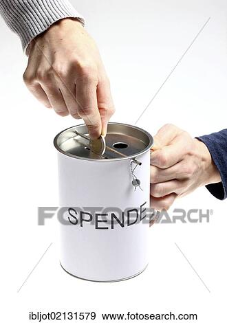 Hands with a donation box labeled Spende, German for donation, with slots for coins and bills, with a security seal to protect against unlawful opening View Large Photo Image Stock Photo - Hands with a donation box labeled Spende, German for donation, with slots for coins and bills, with a security seal to protect against unlawful opening. Fotosearch