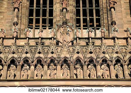 High Gothic jamb statues on the main entrance of the west facade, Strasbourg Cathedral, Cathedral of Our Lady of Strasbourg, Strasbourg, Bas-Rhin department, Alsace, France, Europe, PublicGround, Europe View Large Photo Image Picture - High Gothic jamb statues on the main entrance of the west facade, Strasbourg Cathedral, Cathedral of Our Lady of Strasbourg, Strasbourg, Bas-Rhin department, Alsace, France, Europe, PublicGround, Europe. Fotosearch