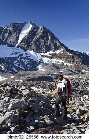 Hiker ascending Tschenglser Hochwand Mountain above the Dusseldorf Hut in Solda, looking towards the Vertainspitze Mountain, Alto Adige, Italy, Europe View Large Photo Image Stock Photograph - Hiker ascending Tschenglser Hochwand Mountain above the Dusseldorf Hut in Solda, looking towards the Vertainspitze Mountain, Alto Adige, Italy, Europe. Fotosearch