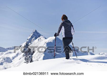 Hiker on Roethenspitz Mountain above Penser Joch Pass, looking towards the summit of Penser Weisshorn Mountain, Sarn Valley, Alto Adige, Italy, Europe View Large Photo Image Stock Image - Hiker on Roethenspitz Mountain above Penser Joch Pass, looking towards the summit of Penser Weisshorn Mountain, Sarn Valley, Alto Adige, Italy, Europe. Fotosearch