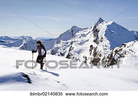 Hiker on the Roethenspitz peak above the Penser Joch pass, behind the peak of Mt. Penser Weissenhorn, Sarn Valley, South Tyrol, Italy, Europe View Large Photo Image Stock Photography - Hiker on the Roethenspitz peak above the Penser Joch pass, behind the peak of Mt. Penser Weissenhorn, Sarn Valley, South Tyrol, Italy, Europe. Fotosearch