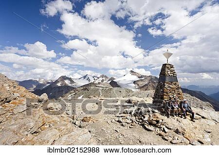 Hiker taking a break on Tisenjoch Pass while ascending Finailspitz Mountain in the Schnalstal Valley, overlooking Similaun Mountain and Hintere Schwaerze Mountain, Alto Adige, Italy, Europe View Large Photo Image Stock Photo - Hiker taking a break on Tisenjoch Pass while ascending Finailspitz Mountain in the Schnalstal Valley, overlooking Similaun Mountain and Hintere Schwaerze Mountain, Alto Adige, Italy, Europe. Fotosearch