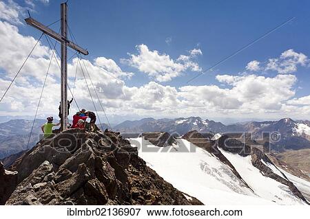 Hikers on the summit of Finailspitze Mountain in the Schnalstal Valley, Alto Adige, Italy, Europe View Large Photo Image Stock Photo - Hikers on the summit of Finailspitze Mountain in the Schnalstal Valley, Alto Adige, Italy, Europe. Fotosearch