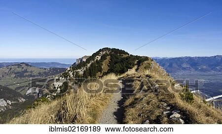 Hiking trail at Mt Hoher Kasten, Alpstein massif, Appenzell Alps, Canton St. Gallen, Switzerland, Europe View Large Photo Image Stock Photo - Hiking trail at Mt Hoher Kasten, Alpstein massif, Appenzell Alps, Canton St. Gallen, Switzerland, Europe. Fotosearch