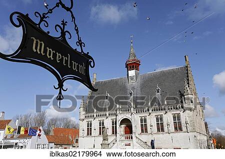 Picture - Historic City Hall and a Memorial to Jacob van Maerlant, Grote Markt square, Damme, West Flanders, Belgium, Europe. Fotosearch