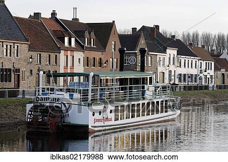 Historical paddle steamer, Lamme Goedzak, on the canal from Bruges to Damme, West Flanders, Belgium, Europe View Large Photo Image Stock Photo - Historical paddle steamer, Lamme Goedzak, on the canal from Bruges to Damme, West Flanders, Belgium, Europe. Fotosearch