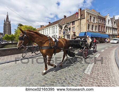 Horse-drawn carriage at the Historical Centre with guild houses on Rozenhoedkaai, Quay of the Rosary, historic city centre of Bruges, UNESCO World Heritage Site, West Flanders, Flemish Region, Belgium, Europe View Large Photo Image Stock Photography - Horse-drawn carriage at the Historical Centre with guild houses on Rozenhoedkaai, Quay of the Rosary, historic city centre of Bruges, UNESCO World Heritage Site, West Flanders, Flemish Region, Belgium, Europe. Fotosearch