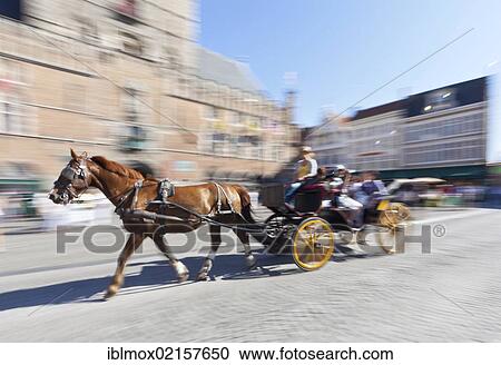 Horse-drawn carriage passing the Belfort belfry or bell tower, Grote Markt market square, historic town centre of Bruges, UNESCO World Heritage Site, West Flanders, Flemish Region, Belgium, Europe View Large Photo Image Stock Image - Horse-drawn carriage passing the Belfort belfry or bell tower, Grote Markt market square, historic town centre of Bruges, UNESCO World Heritage Site, West Flanders, Flemish Region, Belgium, Europe. Fotosearch