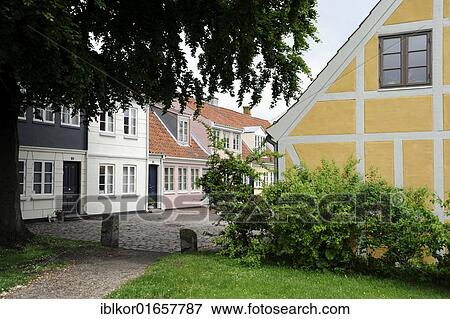 Stock Photo - Houses located in the historic district, Odense, Funen island, Region Syddanmark, Region of Southern Denmark, Denmark, Europe. Fotosearch