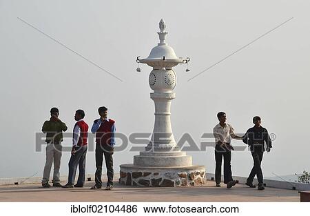 Indian men standing beside a column on the lookout of Vulture Peak, Buddhist pilgrimage, Ragir, Rajgir, Rajagrihain, Sanskrit, Rajagaha, Pali, Bihar, India, Asia View Large Photo Image Stock Photograph - Indian men standing beside a column on the lookout of Vulture Peak, Buddhist pilgrimage, Ragir, Rajgir, Rajagrihain, Sanskrit, Rajagaha, Pali, Bihar, India, Asia. Fotosearch