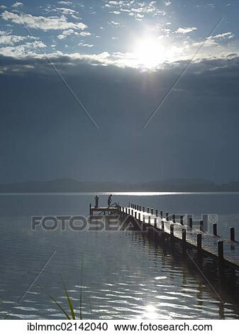 Jetty in Lake Woerthsee, Bavaria, Germany, Europe View Large Photo Image Stock Image - Jetty in Lake Woerthsee, Bavaria, Germany, Europe. Fotosearch