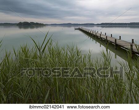 Jetty on Lake Woerthsee, Bavaria, Germany, Europe View Large Photo Image Stock Image - Jetty on Lake Woerthsee, Bavaria, Germany, Europe. Fotosearch