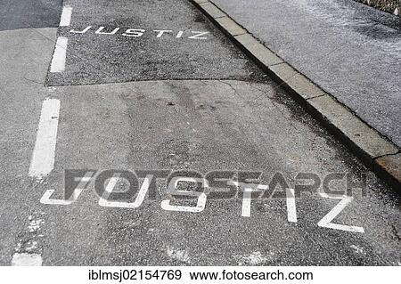 Stock Photo - Justiz, marking on a car park, Salzburg, Austria, Europe. Fotosearch