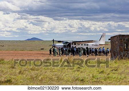 Kenyan children admiring a plane at Keekorok Airstrip, Maasai Mara National Reserve, Kenya, East Africa, Africa, PublicGround, Africa View Large Photo Image Stock Image - Kenyan children admiring a plane at Keekorok Airstrip, Maasai Mara National Reserve, Kenya, East Africa, Africa, PublicGround, Africa. Fotosearch