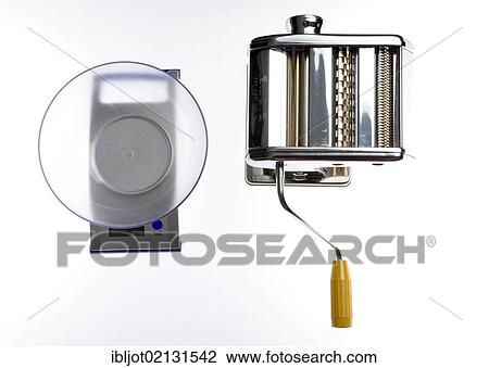 Kitchen scales and a pasta maker View Large Photo Image Stock Image - Kitchen scales and a pasta maker. Fotosearch