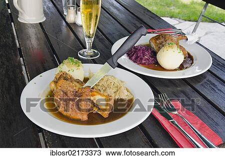 Knuckle of port and a portion of roast duck, Bavarian food, Bavaria, Germany, Europe View Large Photo Image Stock Image - Knuckle of port and a portion of roast duck, Bavarian food, Bavaria, Germany, Europe. Fotosearch