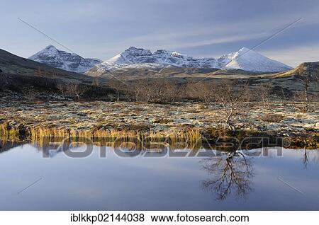 Stock Photo - Lake Doralstjornin in mountain landscape of Rondane National Park, Norway, Europe. Fotosearch