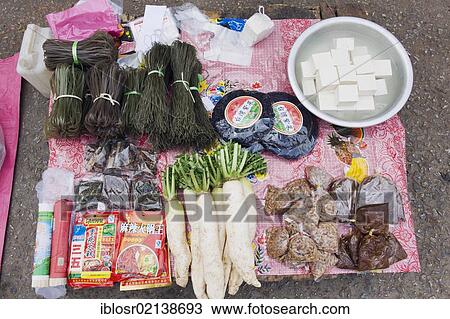 Stock Image - Laotian specialty dishes on the morning market, Luang Prabang, Laos, Indochina, Asia. Fotosearch
