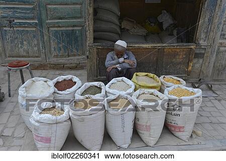 Lentils, grains, legumes, chillies, sleeping street trader, artisan street, Kashgar, Silk Road, Xinjiang, China, Asia View Large Photo Image Stock Image - Lentils, grains, legumes, chillies, sleeping street trader, artisan street, Kashgar, Silk Road, Xinjiang, China, Asia. Fotosearch