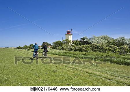 Lighthouse on a dyke, Westermarkelsdorf, Fehmarn Island, Baltic Sea, Schleswig-Holstein, Germany, Europe View Large Photo Image Stock Photograph - Lighthouse on a dyke, Westermarkelsdorf, Fehmarn Island, Baltic Sea, Schleswig-Holstein, Germany, Europe. Fotosearch