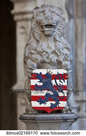 Lion's sculpture with a coat of arms at the Basilica of the Holy Blood, old town of Bruges, UNESCO World Heritage Site, West Flanders, Flemish Region, Belgium, Europe View Large Photo Image Stock Image - Lion's sculpture with a coat of arms at the Basilica of the Holy Blood, old town of Bruges, UNESCO World Heritage Site, West Flanders, Flemish Region, Belgium, Europe. Fotosearch