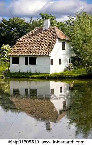 Little old blacksmith's house at village pond, the Funen Village open air museum, Odense, Denmark, Europe View Large Photo Image Stock Image - Little old blacksmith's house at village pond, the Funen Village open air museum, Odense, Denmark, Europe. Fotosearch