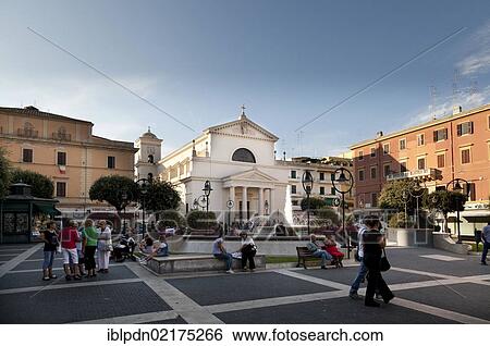 Locals gathering in the Piazza Pia in the evening, Anzio, Lazio, Italy, Europe View Large Photo Image Stock Photograph - Locals gathering in the Piazza Pia in the evening, Anzio, Lazio, Italy, Europe. Fotosearch