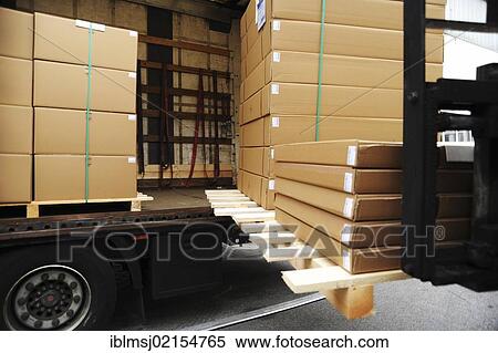 Logistics, loading boxes with a forklift onto a truck, Munich, Bavaria, Germany, Europe View Large Photo Image Stock Photography - Logistics, loading boxes with a forklift onto a truck, Munich, Bavaria, Germany, Europe. Fotosearch